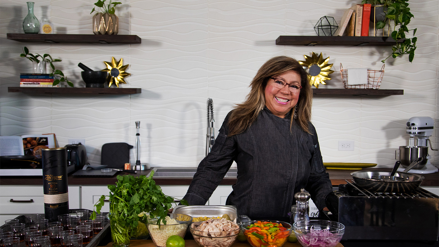 Chef Amalia Moreno-Damgaard using the Kitchen Studio at Rockstoria Studios Minnesota